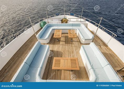 Table and Chairs on Bow Deck of a Luxury Motor Yacht Stock Photo ...