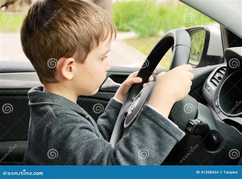 Boy Driving a Car and Looking at the Way Stock Photo - Image of person ...