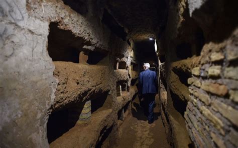 Niches held the shrouded bodies of early Christians in the catacomb of Santa Domitilla, in ...