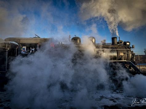 Nevada Northern Railway steam locomotive #93 pulls out into the early morning light at Ely ...