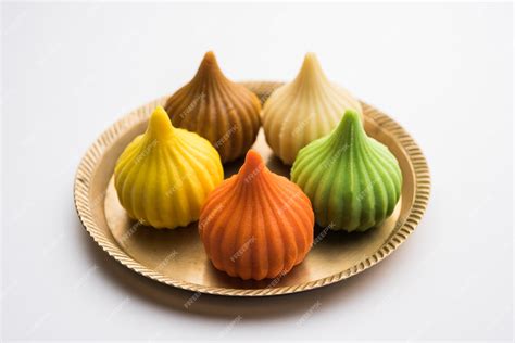 Premium Photo | Modak is an Indian sweet dumpling offered to Lord Ganapati on Ganesh Chaturthi ...
