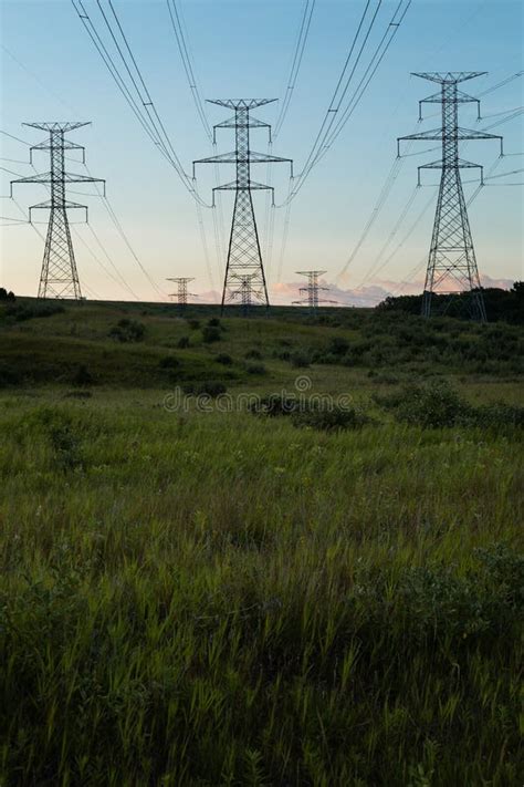 Power Electrical Lines from Hydro Electric Plant by Fields at Sunrise Sunset Stock Image - Image ...