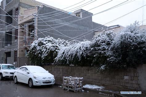 Rare snow pleases people in Iraq's Baghdad - Xinhua | English.news.cn