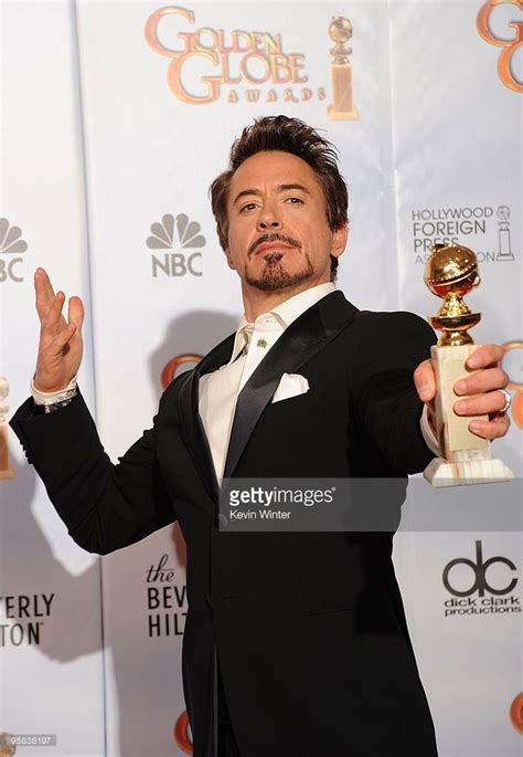 Actor Robert Downey Jr., winner of the Best Actor in a Motion Picture ...