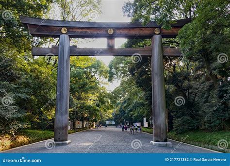 Wooden Torii Gate Of Meiji Jingu Shrine Under Big Tree In Tokyo. Black And White Image Editorial ...