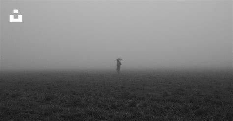 Person holding umbrella under the rain photo – Free Grey Image on Unsplash