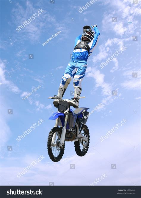 A Stunt Rider Doing Tricks On His Dirt Bike Stock Photo 1599488 ...