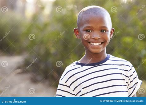 Smiling Young Black Boy Looking To Camera Outdoors Stock Image - Image of american, focus: 99966033