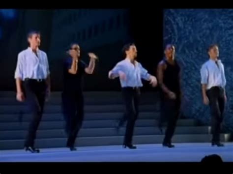 Irish dancers approach group of tap dancers and challenge them to a ...