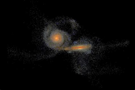 Astronomers catch two giant galaxies merging in images from Europe's Herschel space telescope ...