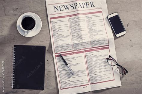 Newspaper on the business table Stock Photo | Adobe Stock