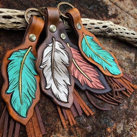 Leather Feather Keychain in 2020 | Leather craft patterns, Feather keychain, Painting leather