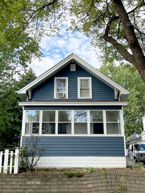 Blue siding with white trim is a classic exterior color scheme. With ...