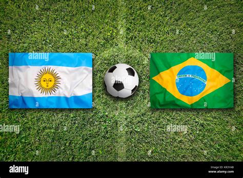 Argentina vs. Brazil flags on soccer field Stock Photo - Alamy