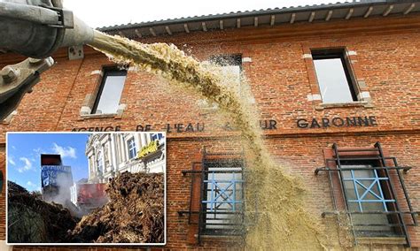 French farmers dump manure on the streets in day of protest