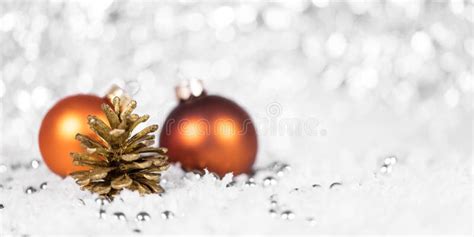 Orange Baubles and Cone with Pearls in the Snow, Festive Background Stock Photo - Image of light ...