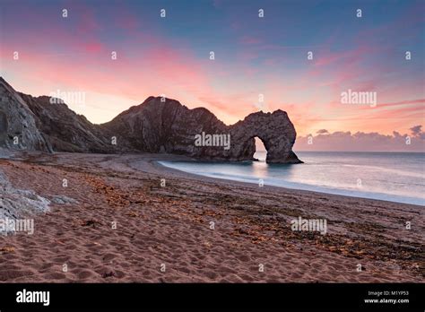 Durdle Door Sunrise Stock Photo - Alamy