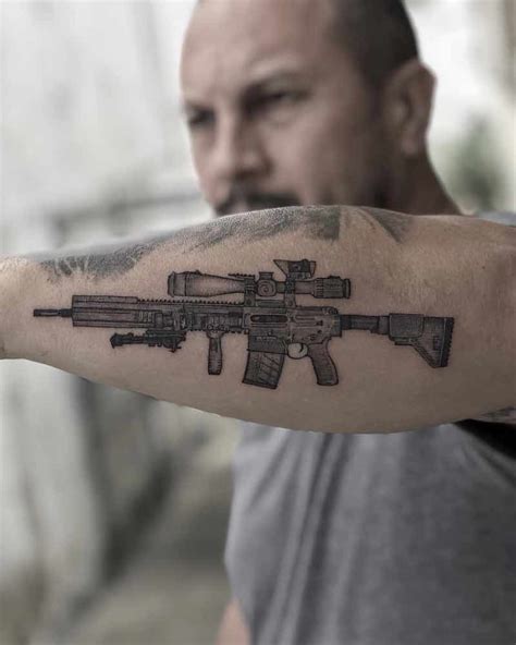 25 of the Best Gun Tattoos - Tattoo Insider