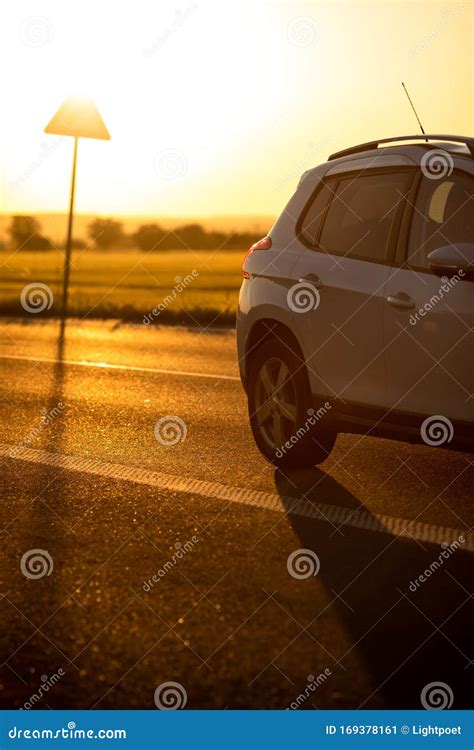 Cars on the road at sunset stock image. Image of speed - 169378161