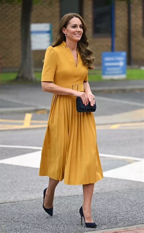 Kate Middleton's exact pleat midi dress is slashed from £219 to £110 in a big Black Friday sale ...