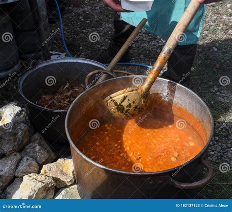 Very Large Cauldron Cooking Food during Campfire. Cooking in a Pot on ...