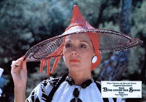 Every true diva needs a giant sun hat... Diana Rigg - Evil Under the Sun Peter Ustinov, Agatha ...