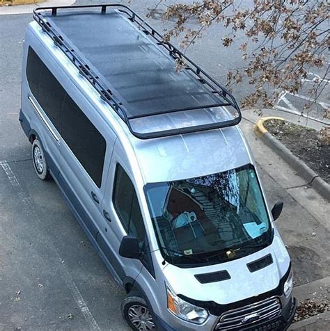 Aluminess roof rack on a Ford Transit adds extra platform for hanging ...