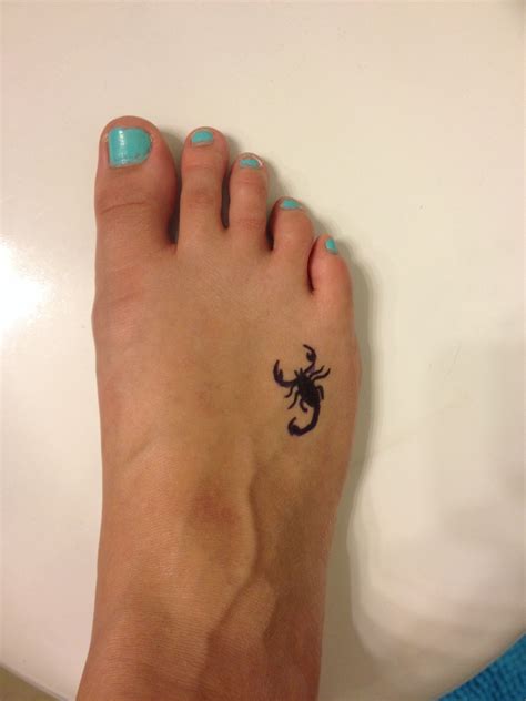 Small scorpion tattoo