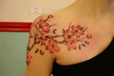 Cherry blossom shoulder tattoo - FaveThing.com