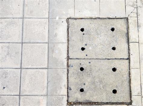 Concrete manhole cover on the pavement. 8806219 Stock Photo at Vecteezy