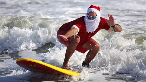 Surfing Santas Ride Waves Along Florida’s Space Coast – NBC 6 South Florida