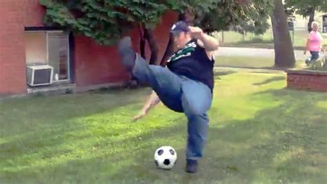 Man gloriously fails attempt to kick soccer ball, on The Feed! - CBS News