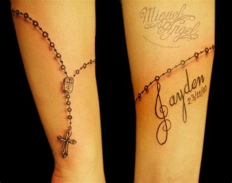 Freehand rosary beads and name tattoo | Tattoos, Cross tattoos for women, Skull tattoos