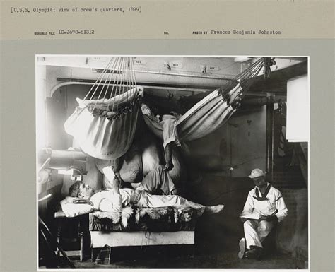 1899 USS Olympia crew three sailors relaxing in their quarters, one man ...