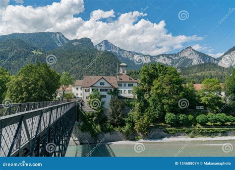 Reichenau Castle and Bridge Over the Rhine with the Swiss Alps in the Background Editorial Stock ...