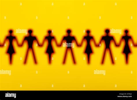 Paper chain people Stock Photo - Alamy