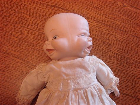 Vintage 3 Faced Porcelain Baby DollKind of Creepy Expression