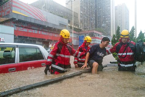 HK flooded by heaviest rainfall in 140 years - Taipei Times