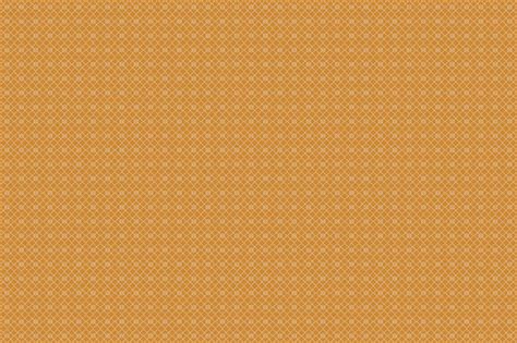 Premium Photo | A simple orange fabric with a white pattern.