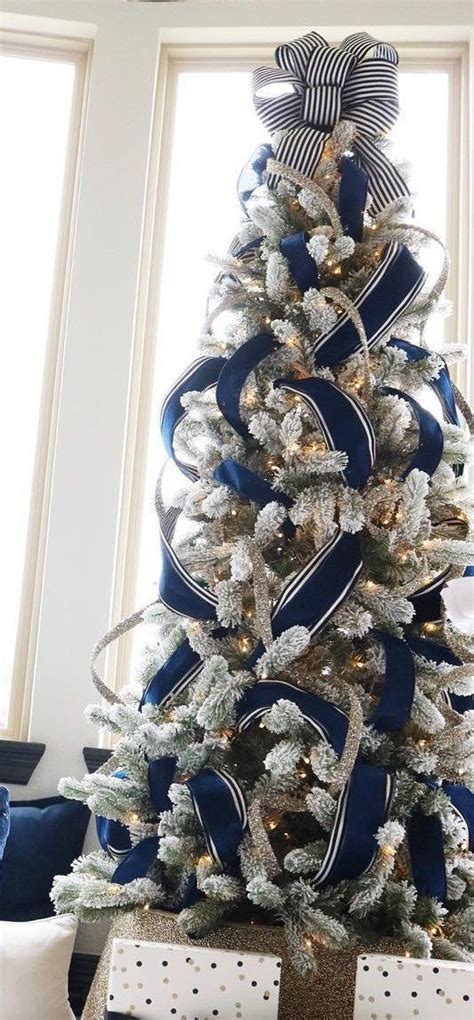 Blue Christmas Tree | Melissa Roberts Interiors Very pretty | Ribbon on christmas tree, Blue ...