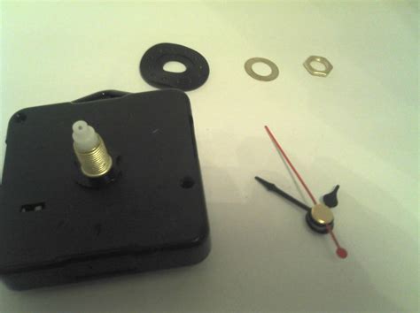 Quartz clock movement (mechanism). Complete with hands and fixings | eBay