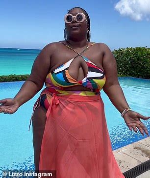 EXCLUSIVE: Lizzo Turns Up The Heat And Stuns In A Multi-Colored One-Piece Swimsuit With A Sheer ...