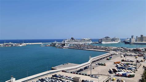 Aerial View of the port in Barcelona with industry and cruise ships ...