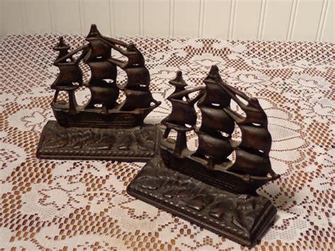 Vintage Cast Iron and Bronze Bookends Old by BubbiesMemories