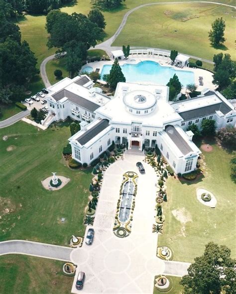 Rick Ross shows off his massive mansion from helicopter view