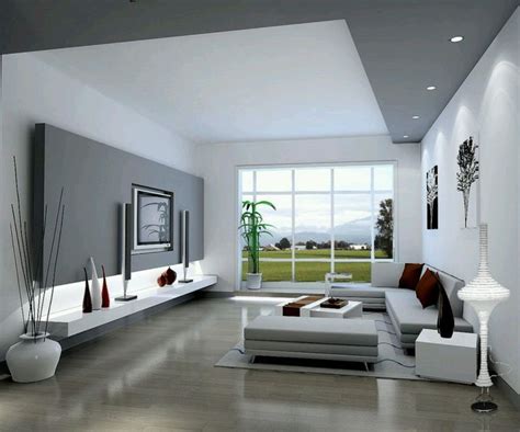 a modern living room with white furniture and large windows