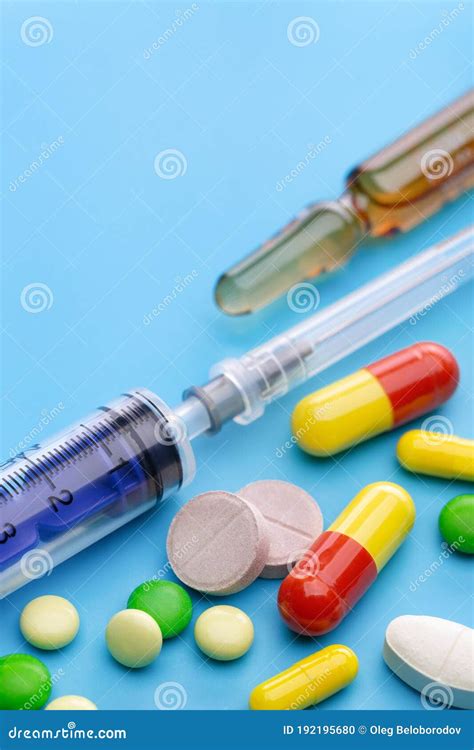 Colored Tablets, Capsules and Injections for Treatment. Stock Photo ...