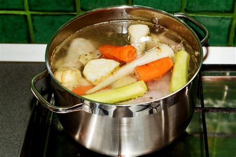 Boiling soup in the pot stock photo. Image of cooker - 48711806