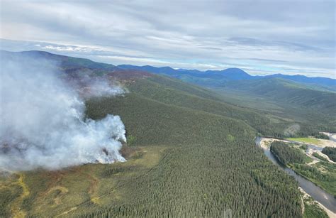 Smokejumpers, helicopter deployed to protect cabins from Yukon Creek Fire north of Salcha River ...