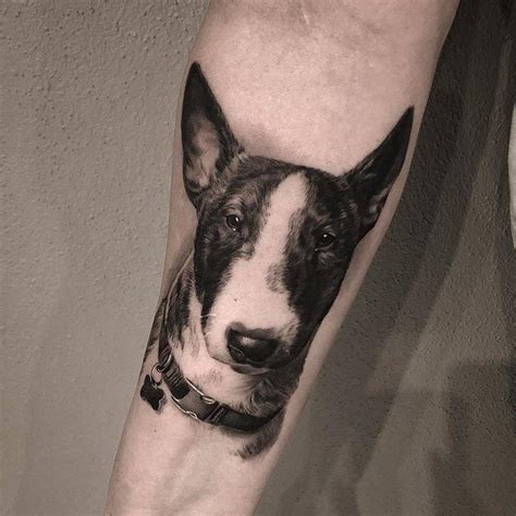 Black and grey bull terrier tattoo on the